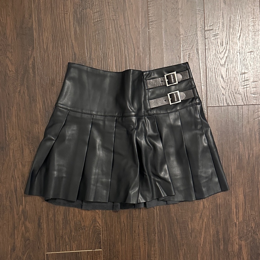 We wore what pleated leather skort